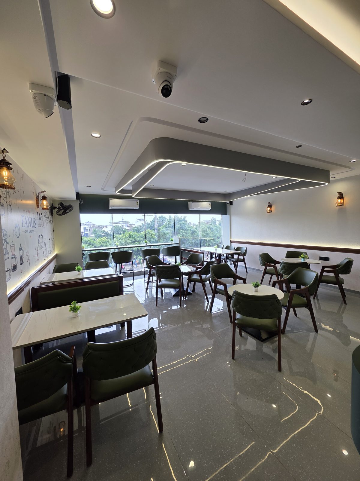 Window-side seating at Fanus Cafe